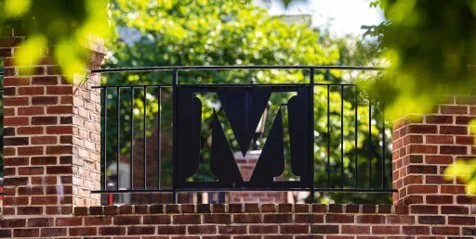 Red Brick Wall with Maryland M in Fencing